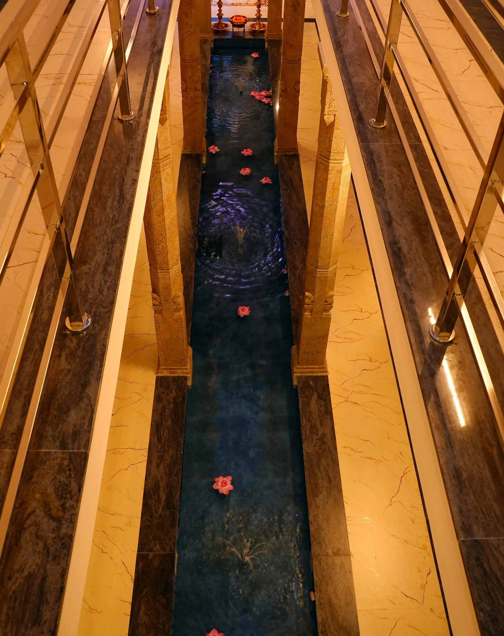 The quiet blue courtyard at Aranya Thanjavur