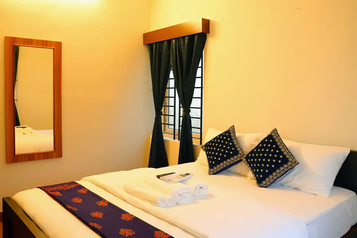 The Aranya queen-bed guest room in Thanjavur