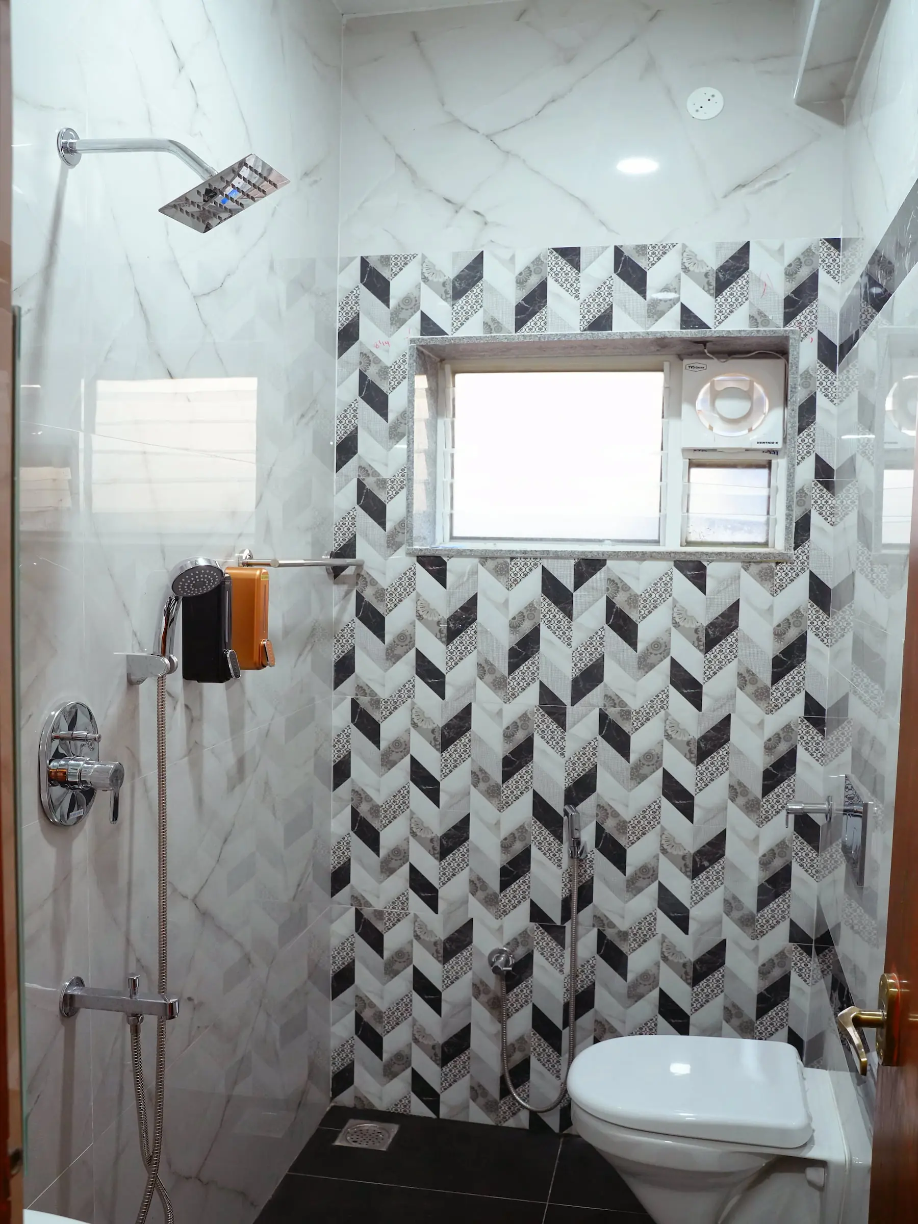 Private attached restroom at Aranya Thanjavur
